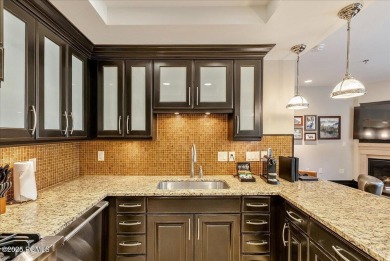 This luxury Waldorf Astoria condominium is set in the Canyons on Canyons Golf Course in Utah - for sale on GolfHomes.com, golf home, golf lot
