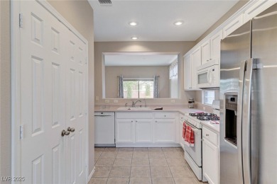 Enjoy views of the foothills from your kitchen table while you on Desert Willow Golf Course in Nevada - for sale on GolfHomes.com, golf home, golf lot
