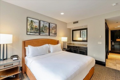 This luxury Waldorf Astoria condominium is set in the Canyons on Canyons Golf Course in Utah - for sale on GolfHomes.com, golf home, golf lot