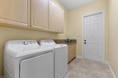 Discover the pinnacle of luxury Florida living in this custom on River Hall Country Club in Florida - for sale on GolfHomes.com, golf home, golf lot