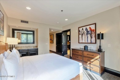 This luxury Waldorf Astoria condominium is set in the Canyons on Canyons Golf Course in Utah - for sale on GolfHomes.com, golf home, golf lot