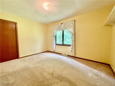 This beautiful ranch home sits on over half an acre and boasts on Green Ridge Golf Course in Ohio - for sale on GolfHomes.com, golf home, golf lot