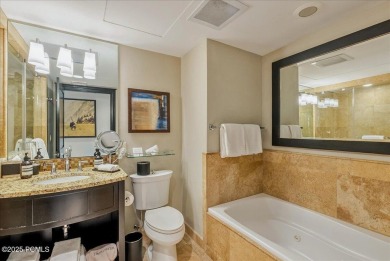 This luxury Waldorf Astoria condominium is set in the Canyons on Canyons Golf Course in Utah - for sale on GolfHomes.com, golf home, golf lot