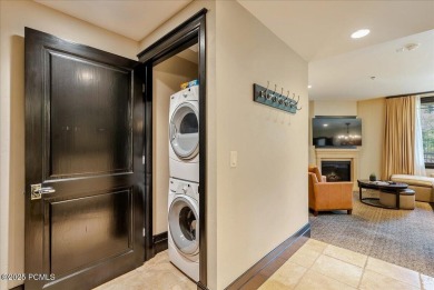 This luxury Waldorf Astoria condominium is set in the Canyons on Canyons Golf Course in Utah - for sale on GolfHomes.com, golf home, golf lot