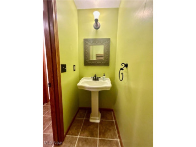 This beautiful ranch home sits on over half an acre and boasts on Green Ridge Golf Course in Ohio - for sale on GolfHomes.com, golf home, golf lot