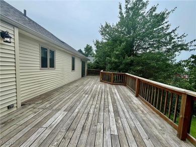 This beautiful ranch home sits on over half an acre and boasts on Green Ridge Golf Course in Ohio - for sale on GolfHomes.com, golf home, golf lot