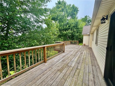 This beautiful ranch home sits on over half an acre and boasts on Green Ridge Golf Course in Ohio - for sale on GolfHomes.com, golf home, golf lot