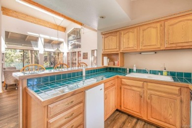 SPACIOUS BEAR MEADOWS CONDO WITH GOLF COURSE AND MOUNTAIN VIEWS on Big Bear Mountain Ski and Golf Resort in California - for sale on GolfHomes.com, golf home, golf lot