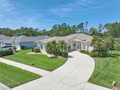 Step into your Floridian oasis nestled within the secure on Sabal Trace Golf and Country Club in Florida - for sale on GolfHomes.com, golf home, golf lot