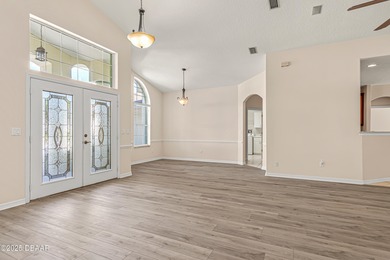 Beautiful spacious & updated home. Enjoy vaulted & high ceilings on Halifax Plantation Golf Club in Florida - for sale on GolfHomes.com, golf home, golf lot