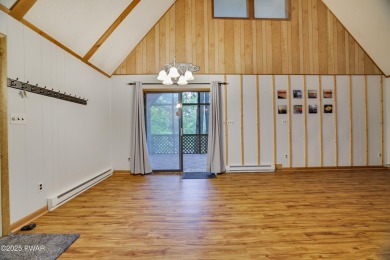Charming Chalet with OVERSIZED SCREENED-IN PORCH in Amenity-Rich on The Hideout Golf in Pennsylvania - for sale on GolfHomes.com, golf home, golf lot