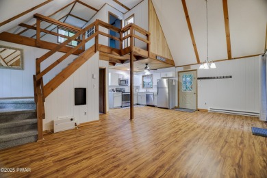 Charming Chalet with OVERSIZED SCREENED-IN PORCH in Amenity-Rich on The Hideout Golf in Pennsylvania - for sale on GolfHomes.com, golf home, golf lot