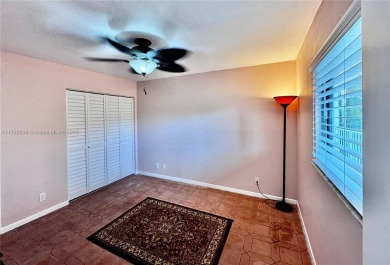 Light, bright & spacious 2 bed/2 bath beautiful home w/lake on Marina Lakes Golf Course in Florida - for sale on GolfHomes.com, golf home, golf lot