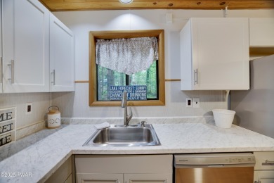 Charming Chalet with OVERSIZED SCREENED-IN PORCH in Amenity-Rich on The Hideout Golf in Pennsylvania - for sale on GolfHomes.com, golf home, golf lot