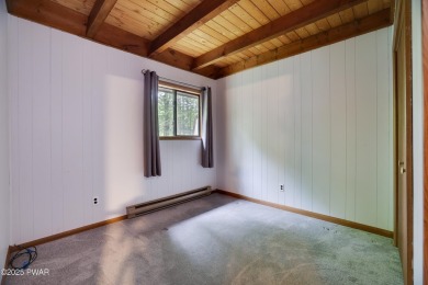 Charming Chalet with OVERSIZED SCREENED-IN PORCH in Amenity-Rich on The Hideout Golf in Pennsylvania - for sale on GolfHomes.com, golf home, golf lot