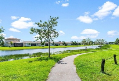 Light, bright & spacious 2 bed/2 bath beautiful home w/lake on Marina Lakes Golf Course in Florida - for sale on GolfHomes.com, golf home, golf lot