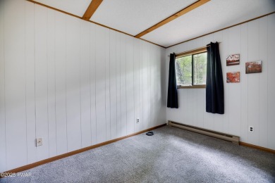 Charming Chalet with OVERSIZED SCREENED-IN PORCH in Amenity-Rich on The Hideout Golf in Pennsylvania - for sale on GolfHomes.com, golf home, golf lot