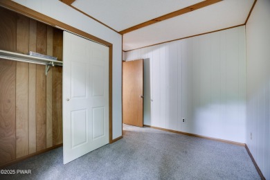 Charming Chalet with OVERSIZED SCREENED-IN PORCH in Amenity-Rich on The Hideout Golf in Pennsylvania - for sale on GolfHomes.com, golf home, golf lot