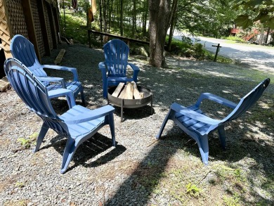 Charming Chalet with OVERSIZED SCREENED-IN PORCH in Amenity-Rich on The Hideout Golf in Pennsylvania - for sale on GolfHomes.com, golf home, golf lot