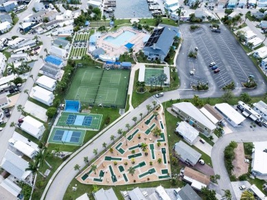 Nestled in the serene, tropical setting of Nettles Island, this on Island Dunes Country Club in Florida - for sale on GolfHomes.com, golf home, golf lot