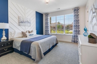 This popular Aubrey floor plan  is located on a quiet street on Wildhorse Golf Club of Robson Ranch in Texas - for sale on GolfHomes.com, golf home, golf lot
