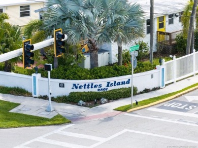 Nestled in the serene, tropical setting of Nettles Island, this on Island Dunes Country Club in Florida - for sale on GolfHomes.com, golf home, golf lot
