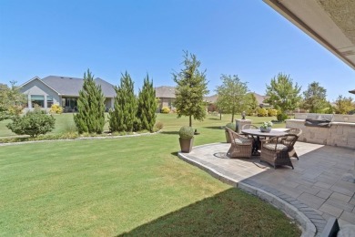 This popular Aubrey floor plan  is located on a quiet street on Wildhorse Golf Club of Robson Ranch in Texas - for sale on GolfHomes.com, golf home, golf lot