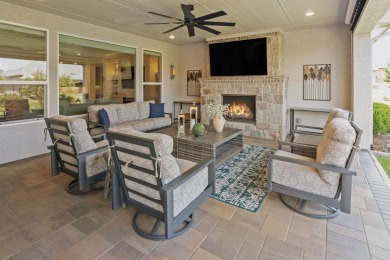 This popular Aubrey floor plan  is located on a quiet street on Wildhorse Golf Club of Robson Ranch in Texas - for sale on GolfHomes.com, golf home, golf lot