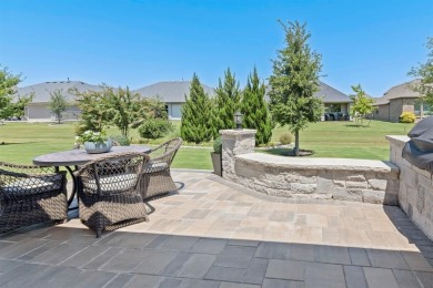 This popular Aubrey floor plan  is located on a quiet street on Wildhorse Golf Club of Robson Ranch in Texas - for sale on GolfHomes.com, golf home, golf lot