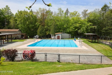 PRICE IMPROVEMENT -  Cozy Poconos Chalet with Huge Screened on The Hideout Golf in Pennsylvania - for sale on GolfHomes.com, golf home, golf lot