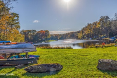 PRICE IMPROVEMENT -  Cozy Poconos Chalet with Huge Screened on The Hideout Golf in Pennsylvania - for sale on GolfHomes.com, golf home, golf lot