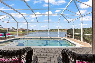 SITED ON PARK-LIKE GROUNDS WITHIN PROMENADE PARKE, THE on Venetian Bay Golf Course in Florida - for sale on GolfHomes.com, golf home, golf lot