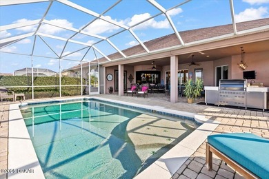 SITED ON PARK-LIKE GROUNDS WITHIN PROMENADE PARKE, THE on Venetian Bay Golf Course in Florida - for sale on GolfHomes.com, golf home, golf lot