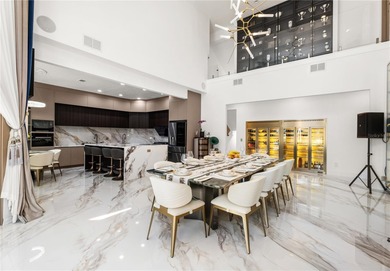 Presenting a newly remodeled luxury estate ideally positioned on Isleworth Golf and Country Club in Florida - for sale on GolfHomes.com, golf home, golf lot