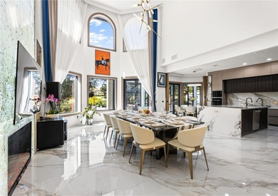 Presenting a newly remodeled luxury estate ideally positioned on Isleworth Golf and Country Club in Florida - for sale on GolfHomes.com, golf home, golf lot