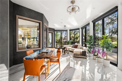 Presenting a newly remodeled luxury estate ideally positioned on Isleworth Golf and Country Club in Florida - for sale on GolfHomes.com, golf home, golf lot