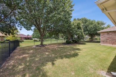 Nestled in the prestigious Robson Ranch community, this on Wildhorse Golf Club of Robson Ranch in Texas - for sale on GolfHomes.com, golf home, golf lot