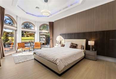 Presenting a newly remodeled luxury estate ideally positioned on Isleworth Golf and Country Club in Florida - for sale on GolfHomes.com, golf home, golf lot