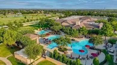 Nestled in the prestigious Robson Ranch community, this on Wildhorse Golf Club of Robson Ranch in Texas - for sale on GolfHomes.com, golf home, golf lot