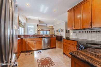 Welcome to this 4-bedroom, 3.5-bath home in the sought-after Sea on Sea Trail Golf Resort in North Carolina - for sale on GolfHomes.com, golf home, golf lot