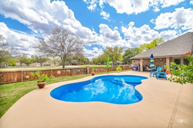 Nestled on the serene golf course of Bentwood country club, this on Bentwood Country Club in Texas - for sale on GolfHomes.com, golf home, golf lot
