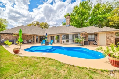 Nestled on the serene golf course of Bentwood country club, this on Bentwood Country Club in Texas - for sale on GolfHomes.com, golf home, golf lot