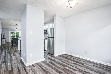 This beautifully updated 2 bedroom and 2 bath, second-floor on  in South Carolina - for sale on GolfHomes.com, golf home, golf lot