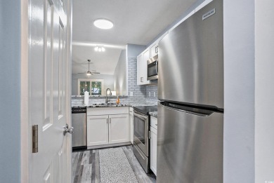 This beautifully updated 2 bedroom and 2 bath, second-floor on  in South Carolina - for sale on GolfHomes.com, golf home, golf lot