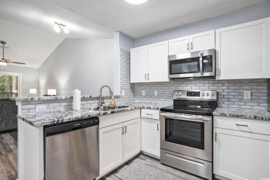 This beautifully updated 2 bedroom and 2 bath, second-floor on  in South Carolina - for sale on GolfHomes.com, golf home, golf lot