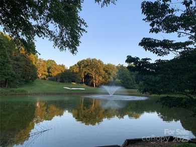 Discover this exceptional end-unit townhome, offering an on Raintree Country Club in North Carolina - for sale on GolfHomes.com, golf home, golf lot