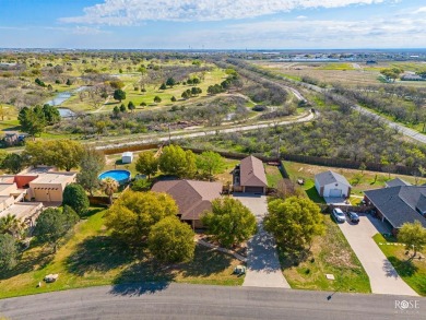 Located in Country Club Lake Estates, this 3-bed, 2-bath home on San Angelo Country Club in Texas - for sale on GolfHomes.com, golf home, golf lot