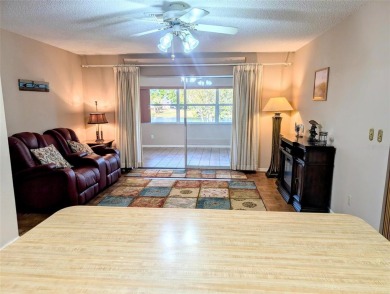 Fabulous,  beautifully maintained Twintree  with gorgeous lake on Caloosa Greens Executive Golf Course in Florida - for sale on GolfHomes.com, golf home, golf lot