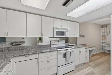 ENJOY COASTAL LIVING AT ITS BEST AT OCEANS CLOVERLEAF CONDO, A on Oceans Golf Club in Florida - for sale on GolfHomes.com, golf home, golf lot