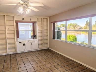 Fabulous,  beautifully maintained Twintree  with gorgeous lake on Caloosa Greens Executive Golf Course in Florida - for sale on GolfHomes.com, golf home, golf lot